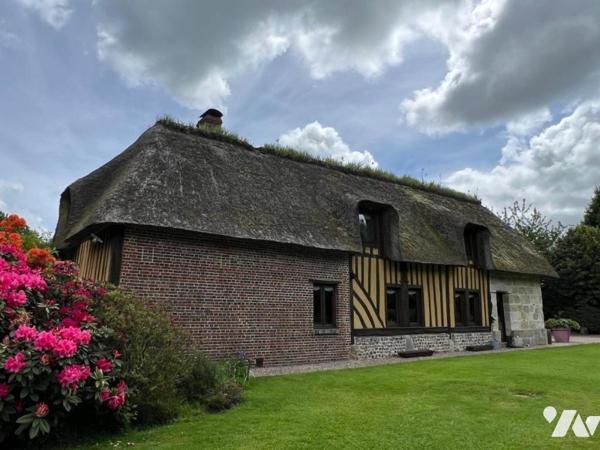 Entre Orbec et Livarot belle propriété composée de plusieurs maisons bel environnement