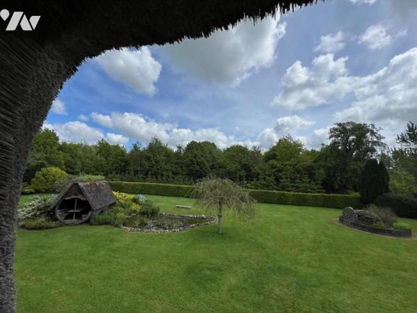 Entre Orbec et Livarot belle propriété composée de plusieurs maisons bel environnement
