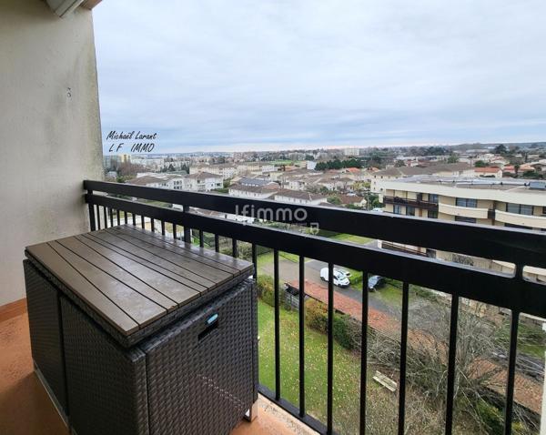 Appartement traversant T4 76m2 + garage