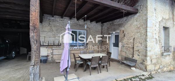 Nurieux-Volognat –RARE- Ancienne ferme en pierre rénovée avec deux logements et vastes dépendances