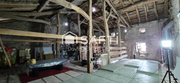 Nurieux-Volognat –RARE- Ancienne ferme en pierre rénovée avec deux logements et vastes dépendances