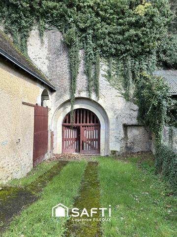 Grange avec sa cave creusée dans la roche