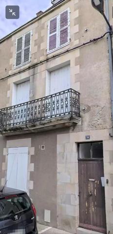 Maison ancienne divisée en 4 appartements