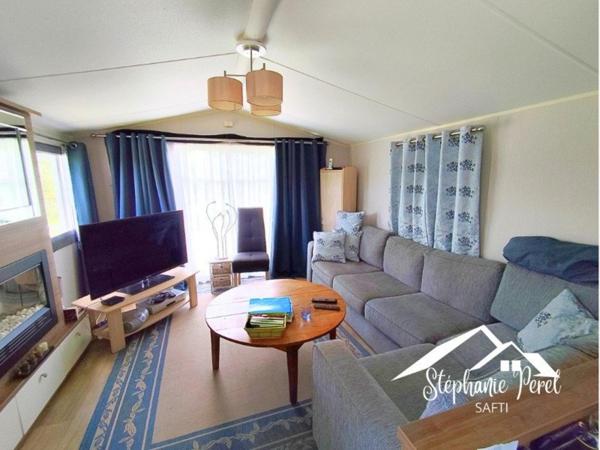 Investissez dans le calme : terrain avec mobil home et potentiel locatif.