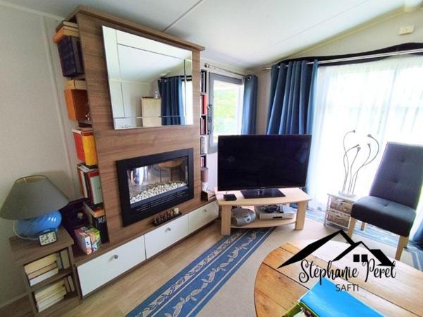 Investissez dans le calme : terrain avec mobil home et potentiel locatif.