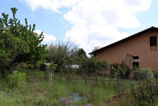 Jolie villa de 117 m² à fort potentiel avec un beau terrain arboré à CURCIAT DONGALON (01)