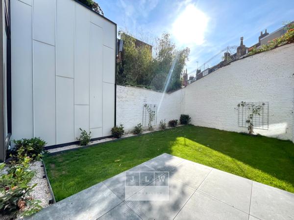 Appartement 2 chambres rénové avec jardin