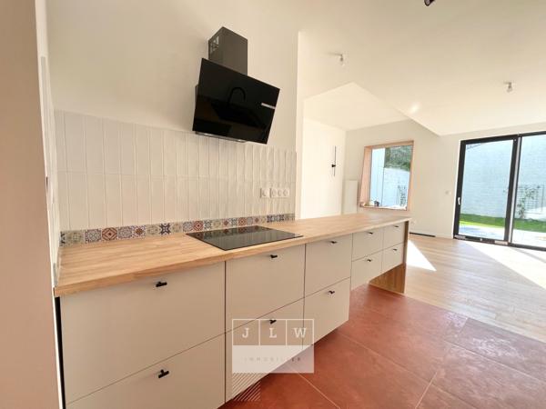 Appartement 2 chambres rénové avec jardin