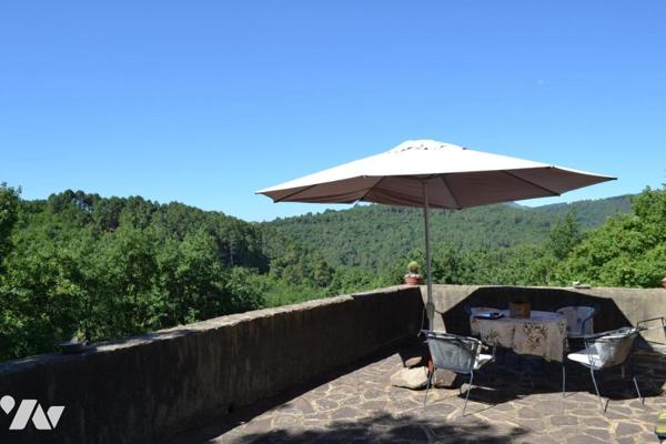 BATISSE EN PIERRE AVEC TERRAIN ATTENANT DE 8806 m²