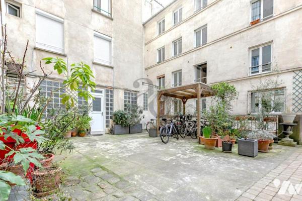 Belleville – Charmant 2 pièces, lumineux sur rue, cave incluse