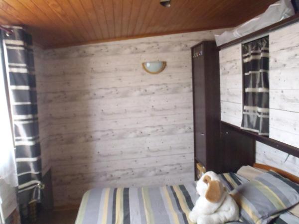 Maison individuelle 47 m2 avec une chambre, deux terrasses exposées sud ouest, une cour fermé 2 places de parking