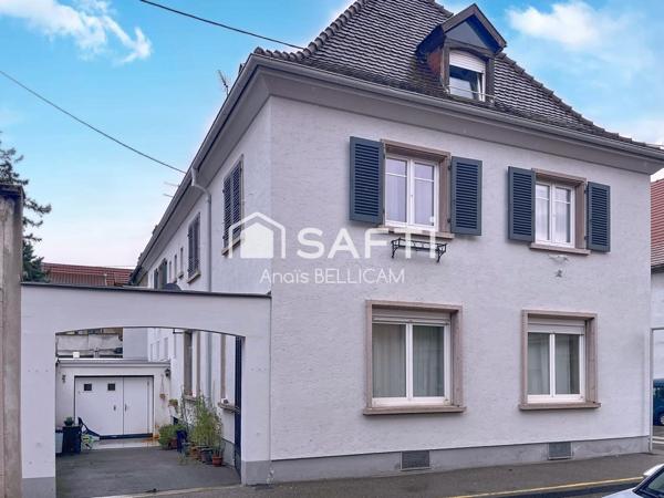 Superbe Appartement de 102 m² avec garage, cave et cour privée