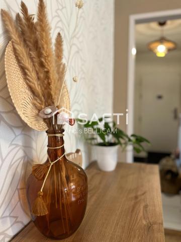 Superbe Appartement de 102 m² avec garage, cave et cour privée