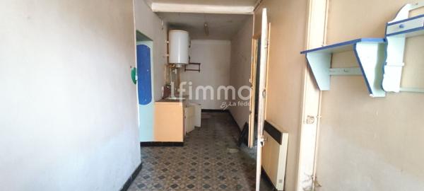 Ensemble immobilier de 3 maisons de village.