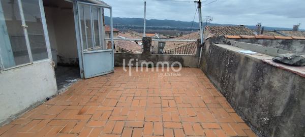 Ensemble immobilier de 3 maisons de village.