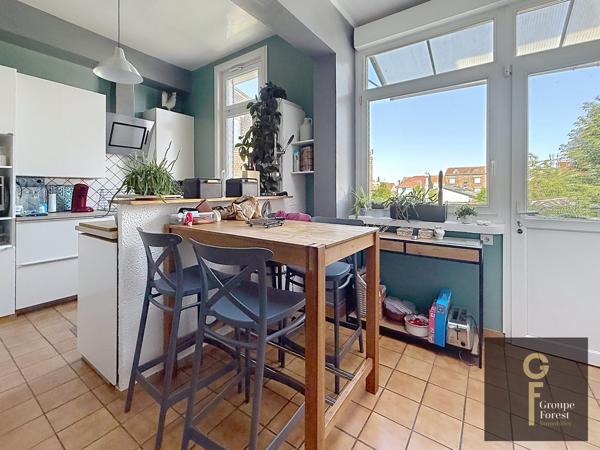 BEL ETAGE AVEC TERRAIN ATTENANT