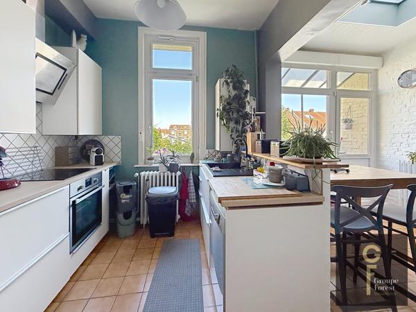 BEL ETAGE AVEC TERRAIN ATTENANT
