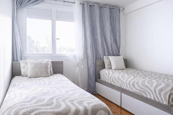 Grand T4 avec 2 balcons & garage – Métro à 3 min