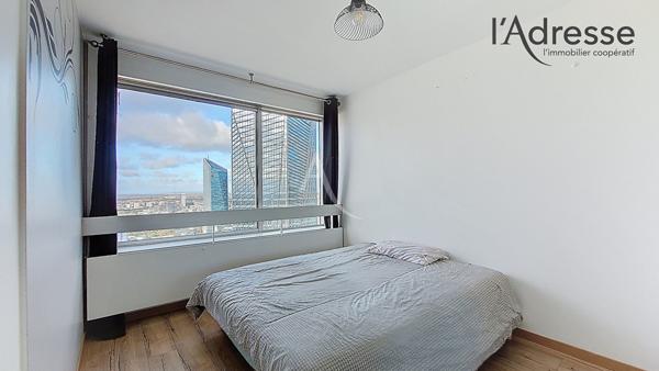 PUTEAUX/ DEFENSE appartement 4 pièces de 92m² avec cave et parking