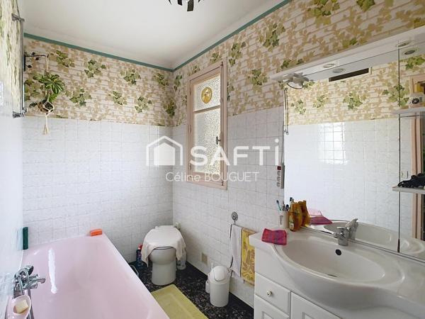 Maison R+1 avec double garage et jardin