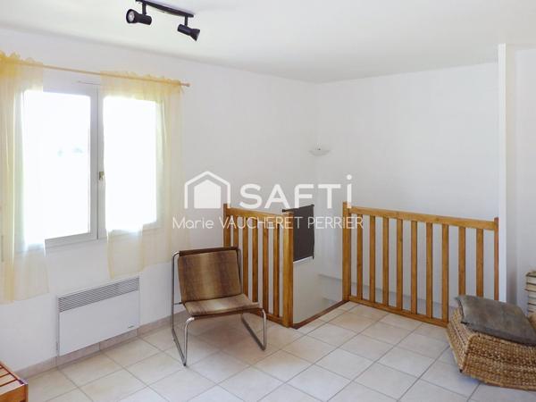 Maison familiale avec double garage et jardin au calme