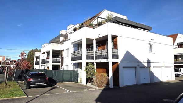 Appartement 3 pièces en rez-de-jardin + garage et parking