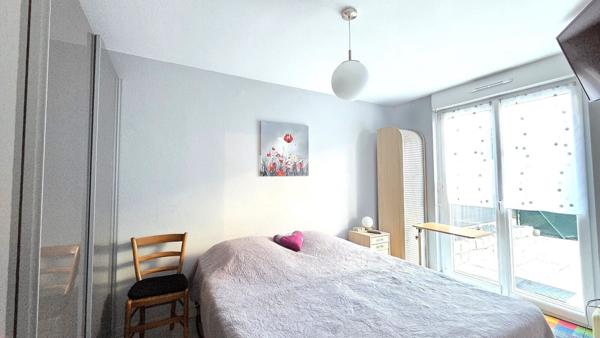 Appartement 3 pièces en rez-de-jardin + garage et parking