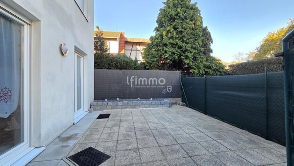 Appartement 3 pièces en rez-de-jardin + garage et parking