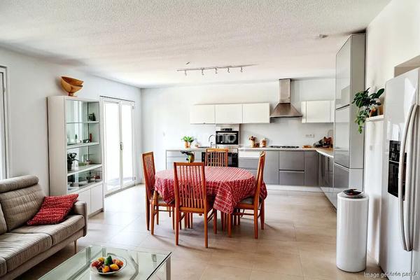 Appartement 3 pièces en rez-de-jardin + garage et parking