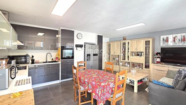 Appartement 3 pièces en rez-de-jardin + garage et parking