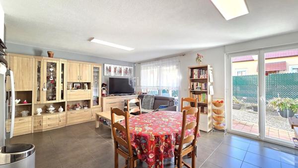 Appartement 3 pièces en rez-de-jardin + garage et parking