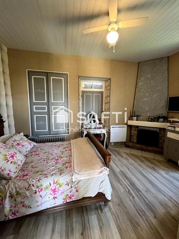 MAISON DE CARACTÈRE AVEC POTENTIEL D'AGRANDISSEMENT