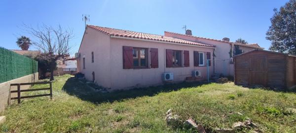 Maison 3 faces de plain pied , jardin et garage