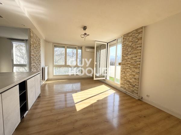 Appartement T3 de 68,12 m² avec balcon, cave et possibilité garage