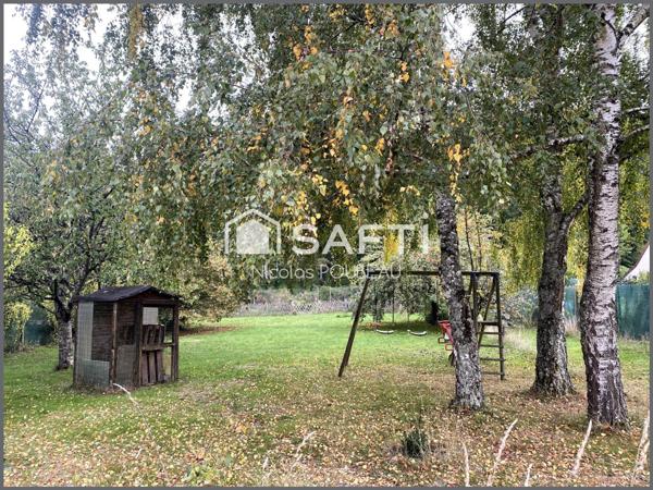 Une charmante maison dans son écrin de verdure !