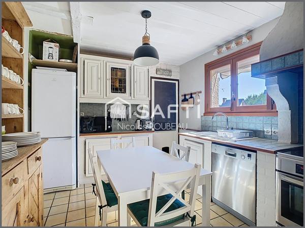 Une charmante maison dans son écrin de verdure !