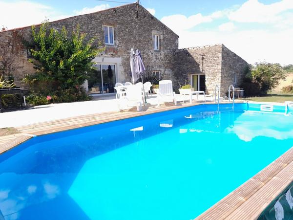 Maison en pierre sur joli terrain arboré et vallonné à Saint Martin des Fontaines