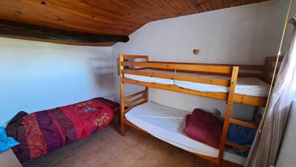 Maison en pierre sur joli terrain arboré et vallonné à Saint Martin des Fontaines