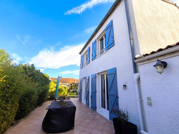 Maison familiale rénovée de 114 m² avec garage et terrain dans quartier calme de Carcassonne