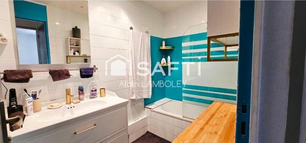 "Appartement T3 – Immeuble rénové, cave et parking"