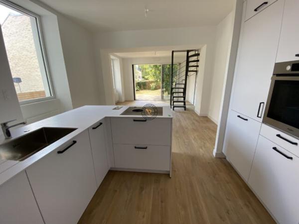 Appartement neuf centre ville avec jardin