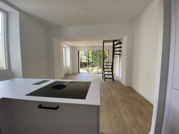 Appartement neuf centre ville avec jardin
