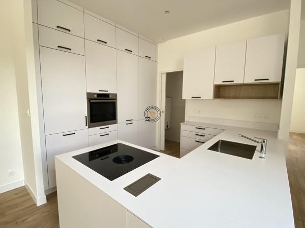 Appartement neuf centre ville avec jardin