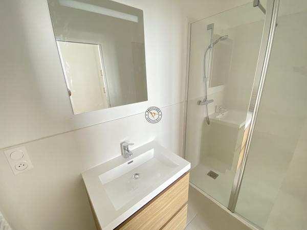 Appartement neuf centre ville avec jardin