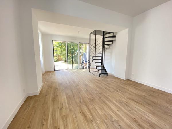 Appartement neuf centre ville avec jardin