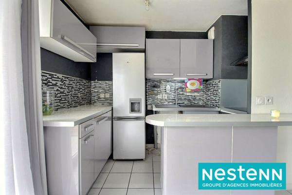 Appartement T3 de 55,08 m² avec balcon, garage et ascenseur - Vaulx-en-Velin Village