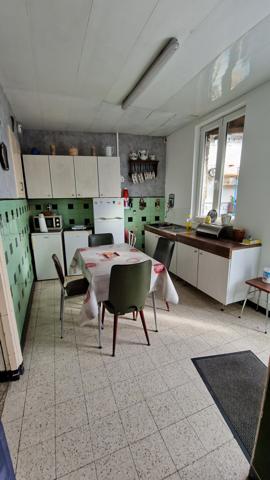 MAISON DE COMMERCE ET D'HABITATION