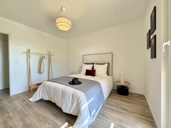 T4 en RDC avec sa terrasse de 14m² + jardin de 102.52m² + 2 parkings extérieurs