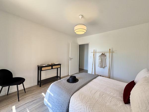 T4 en RDC avec sa terrasse de 14m² + jardin de 102.52m² + 2 parkings extérieurs