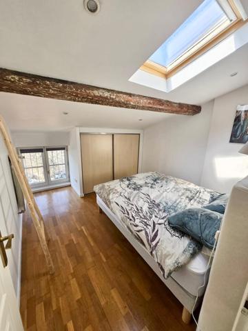 Appartement ancien rénové de type 3, avec cave et stationnement